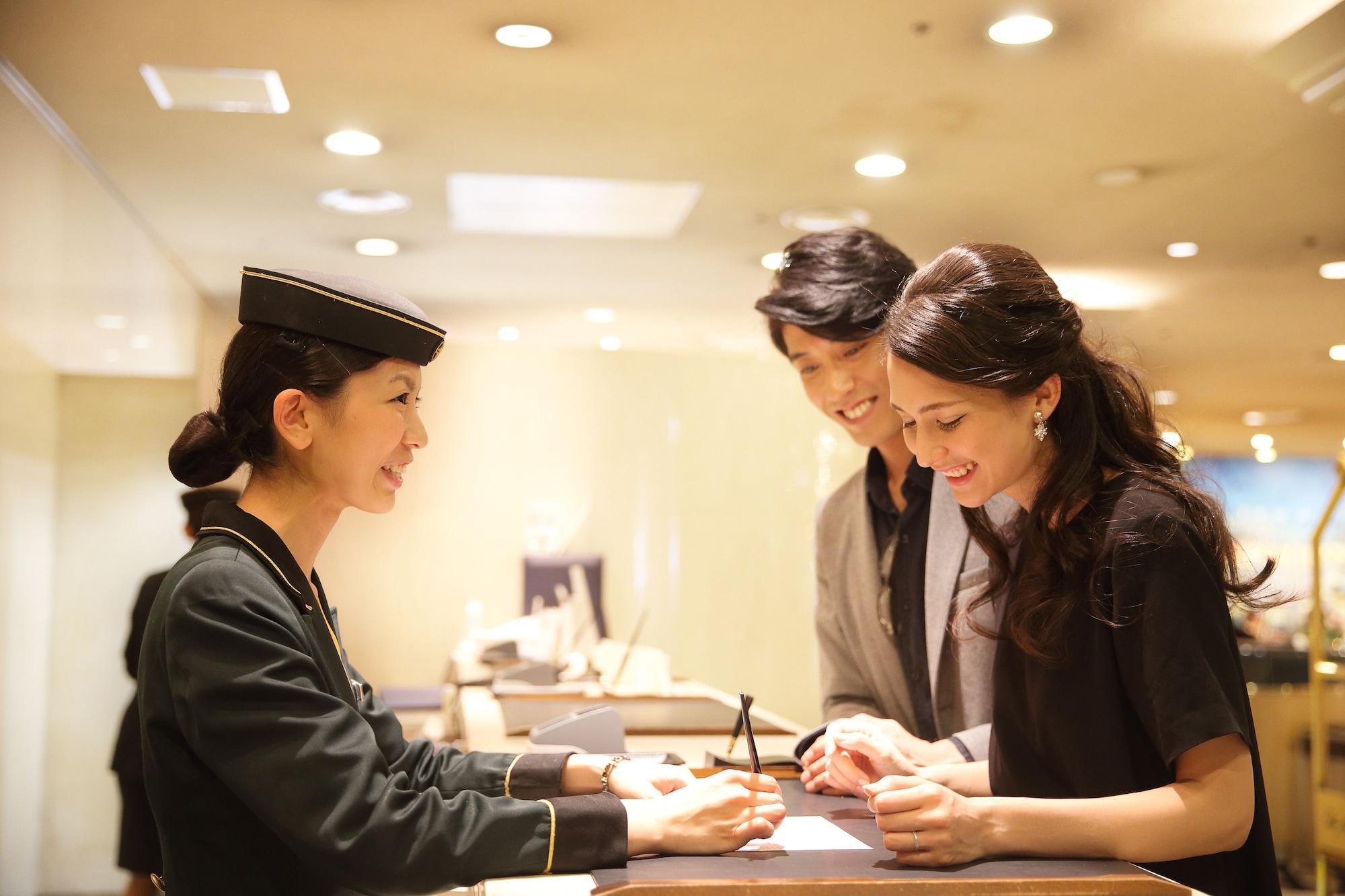 فندق نيو أوتاني هاكاتا فوكوكا المظهر الخارجي الصورة A Korean hotel concierge